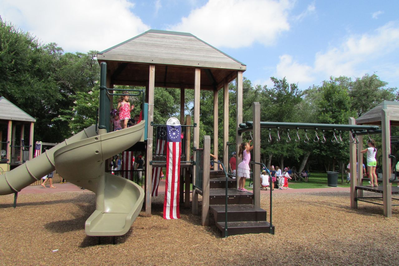 Patriotic playground decorations at the Monte Vista Historical Association 4th of July picnic | San Antonio Charter Moms