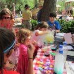 The Do Seum table at the Monte Vista Historical Association 4th of July picnic | San Antonio Charter Moms