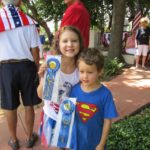 Sophia and Lucas Rico with first place ribbons for best decorated bikes at the Monte Vista Historical Association 4th of July parade and picnic | San Antonio Charter Moms