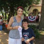 Jacquelyn and Charlie Fagan with third place ribbon for best pie at the Monte Vista Historical Association 4th of July picnic | San Antonio Charter Moms