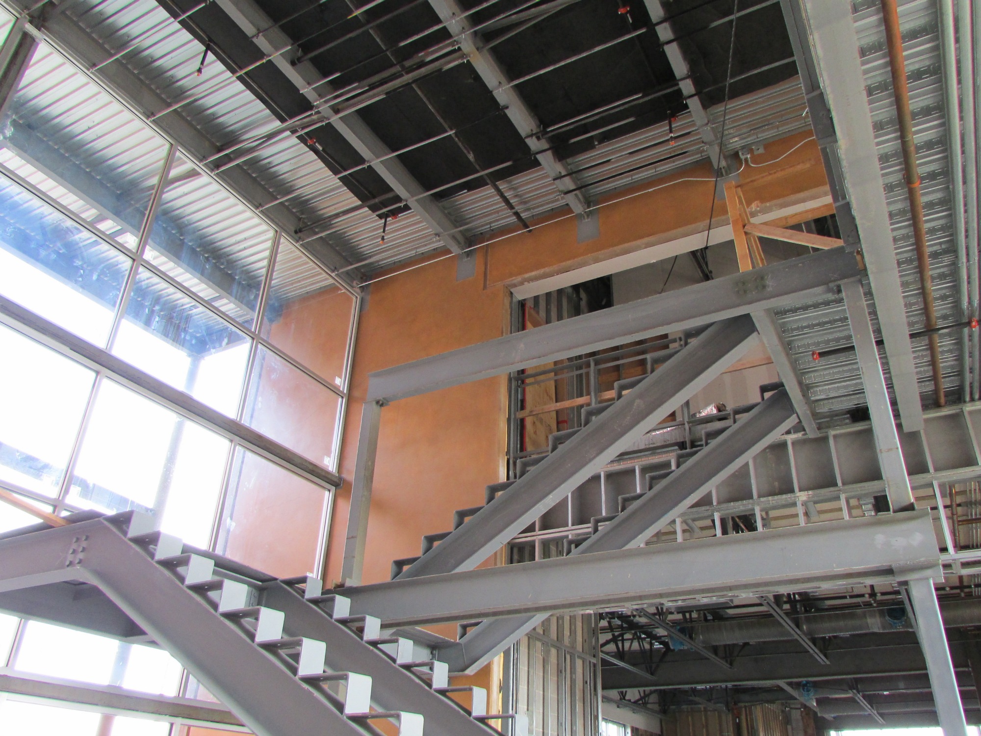 Stairs in the connector space at the The Do Seum | San Antonio Charter Moms