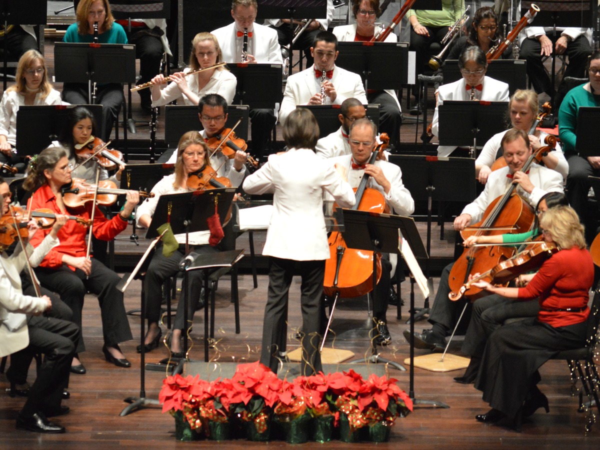 Akiko Fujimoto conducting San Antonio Symphony Holiday Pops at the Tobin Center | San Antonio Charter Moms