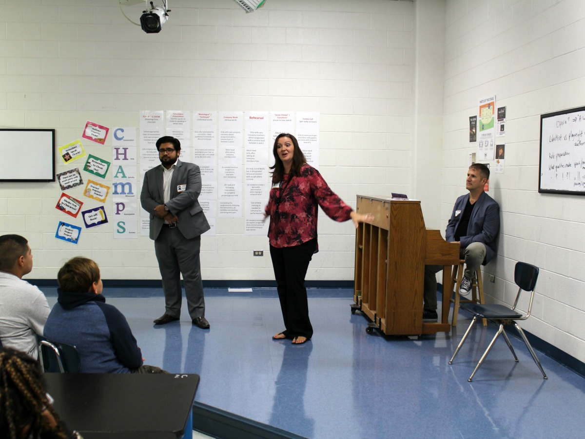 Teaching artists Thomas Soto and Madeline Elizondo with students at OPERA San Antonio school visit at Kirby Middle School in Judson ISD | San Antonio Charter Moms
