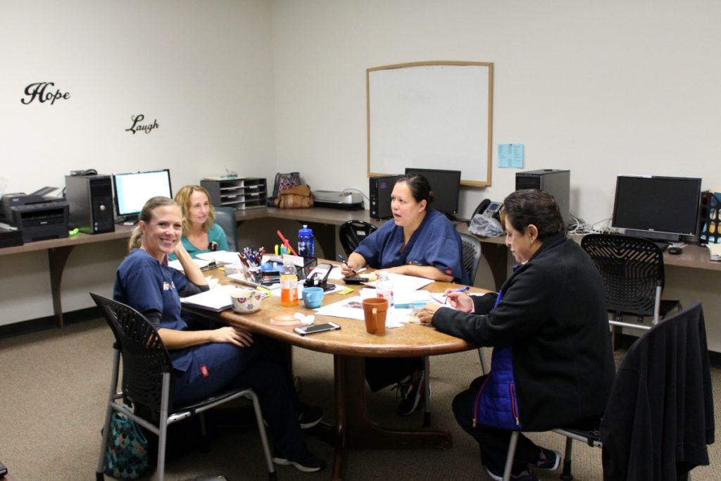 Chief Medical Officer Dr. A. Patricia "Patty" Del Angel, Occupational Therapist (OT) Dr. Carrie Alvarado, Speech-Language Pathologist (SLP) Mary Fleenor, and Board Certified Behavior Analyst (BRBA) Cindy Reidinger at a diagnostic team meeting at Autism Community Network | San Antonio Charter Moms