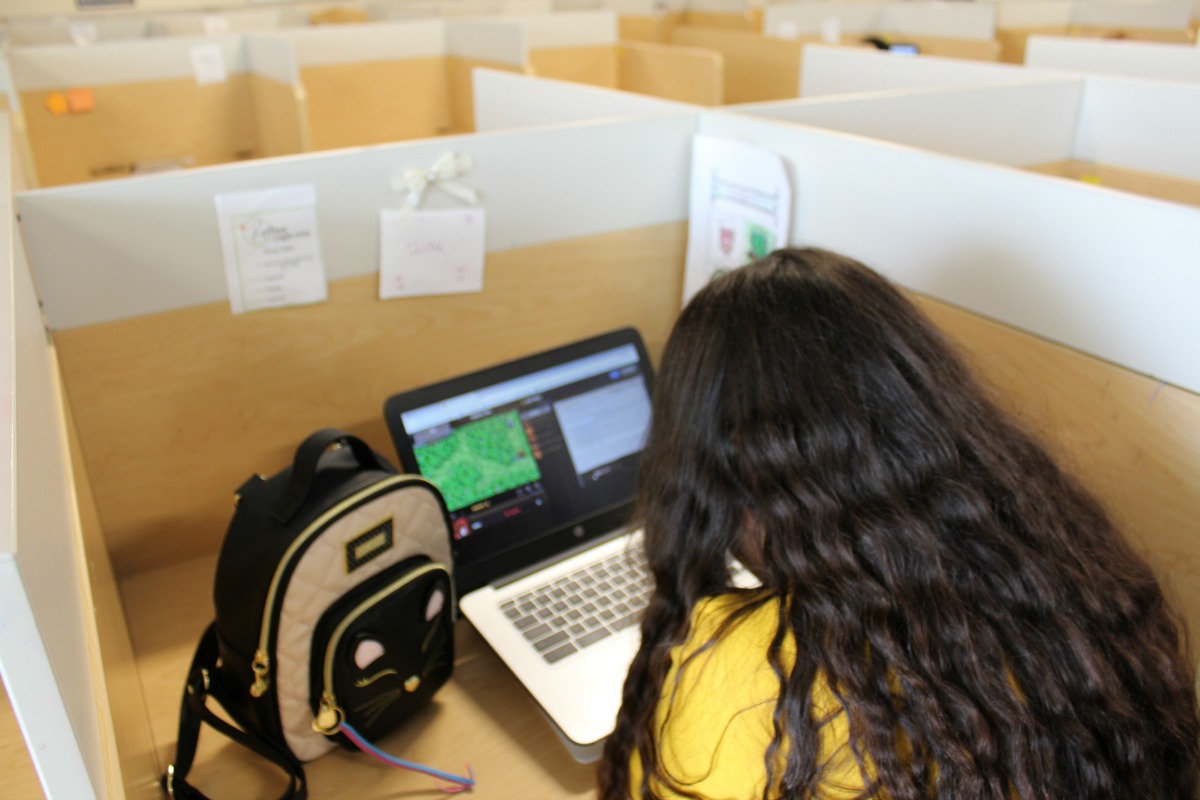 Individual student work on computer programming at Carpe Diem Westwood | San Antonio Charter Moms