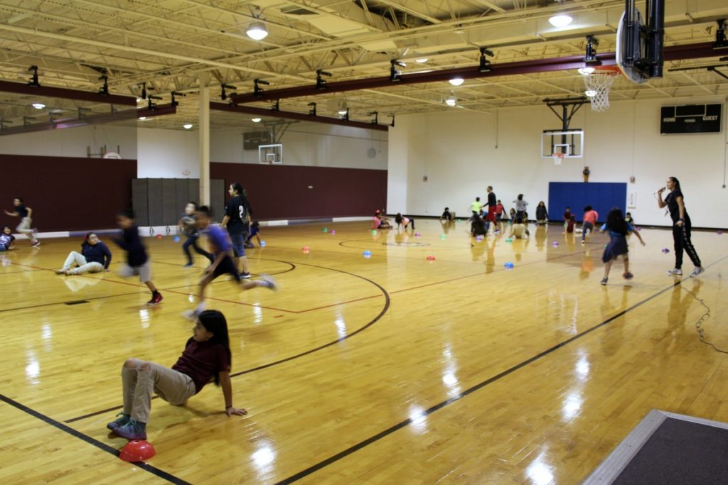 Elementary physical education class in the gymnasium at Jubilee - Lake View University Prep | San Antonio Charter Moms