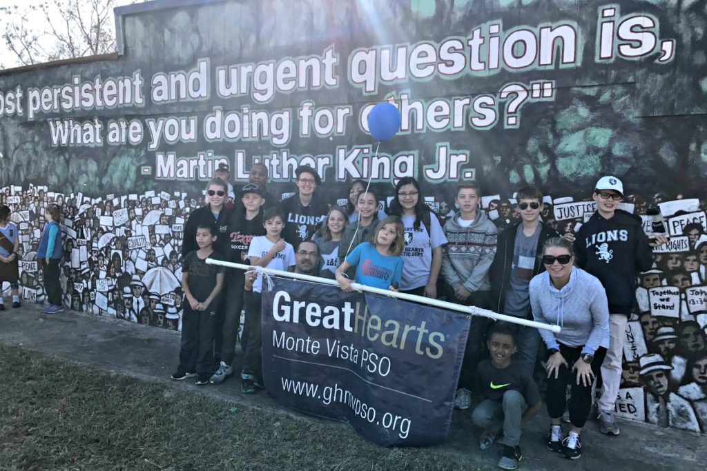 Great Hearts Monte Vista families at mural at MLK March | San Antonio Charter Moms
