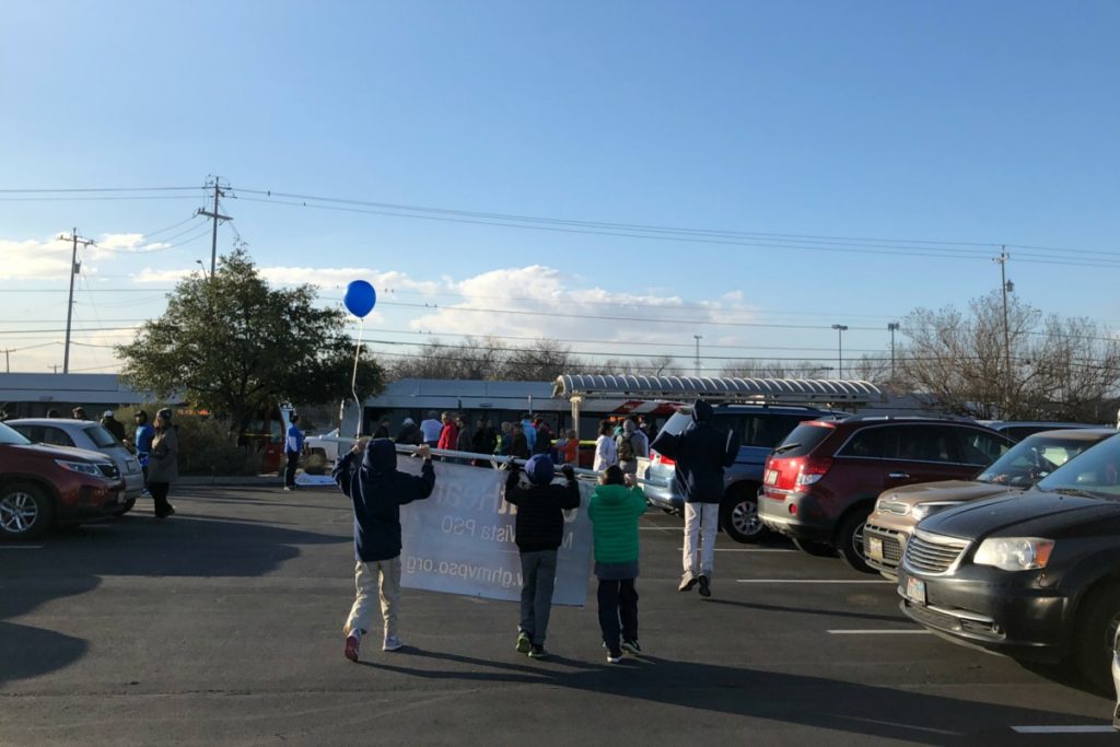 Freeman Coliseum shuttle buses at MLK March | San Antonio Charter Moms