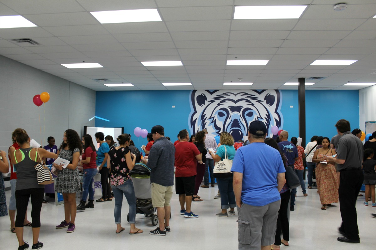 Friends, family, and supporters tasting and judging tacos at the Gathering Place's Great Food Truck Summer Camp Showcase | San Antonio Charter Moms