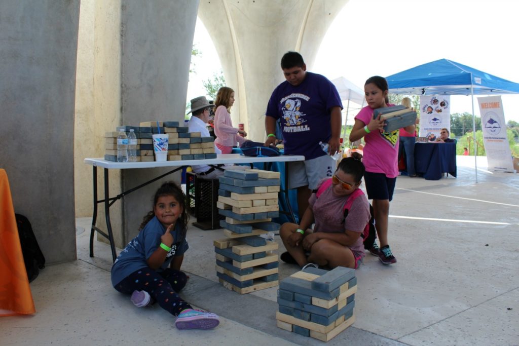 Giant Jenga game at the San Antonio Charter Moms table at the Families Empowered Back to School Bash | San Antonio Charter Moms