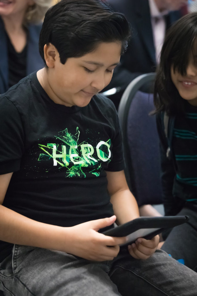 A student using the San Antonio Charter Schools app during the launch event