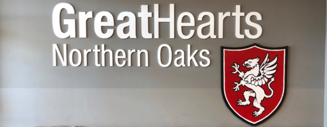 great hearts northern oaks logo on school wall