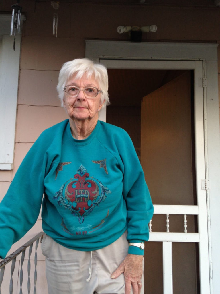 Anne's 87-year-old neighbor, Mary. Social distancing will protect her from illness.
