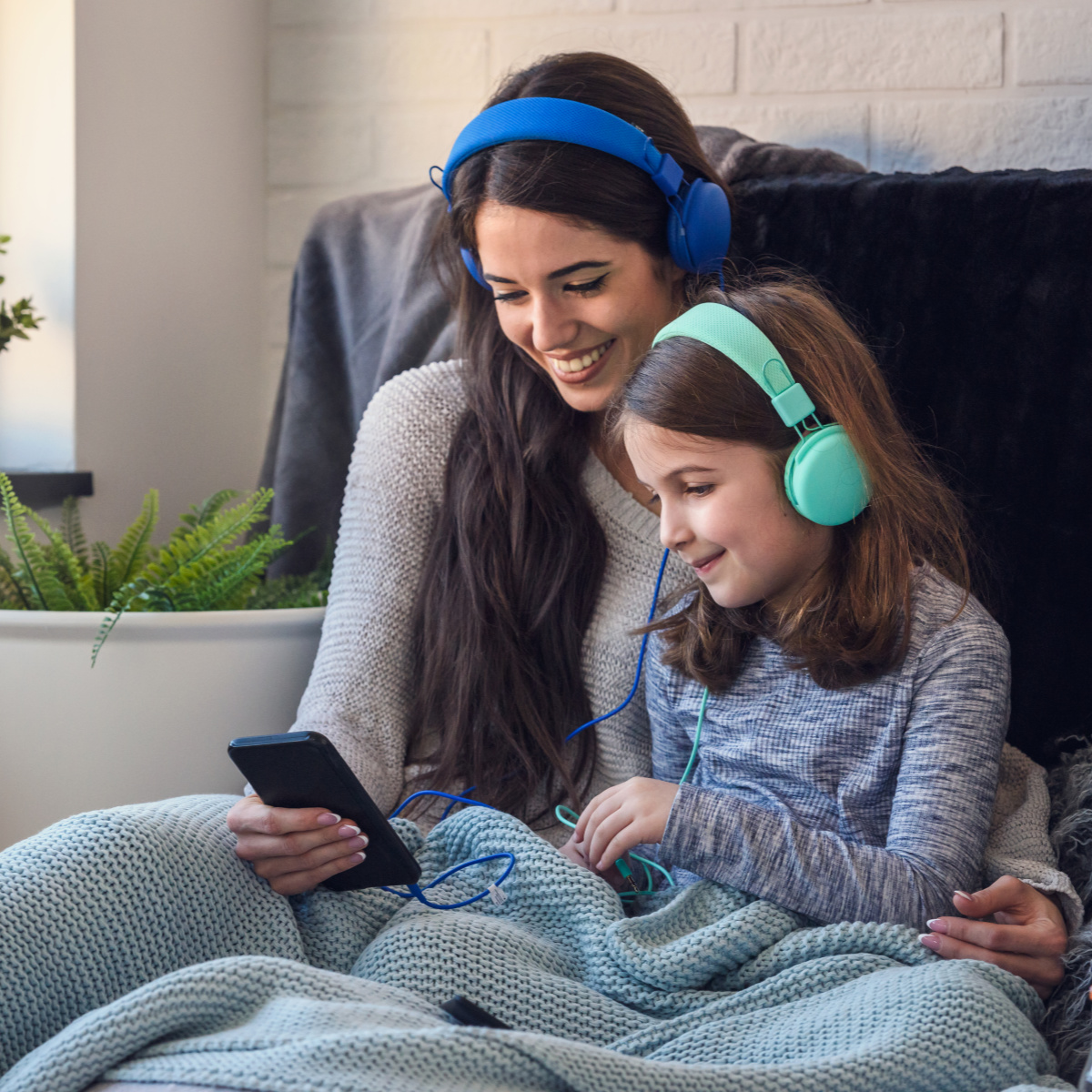 mother daughter device headphones audiobook joy reading books