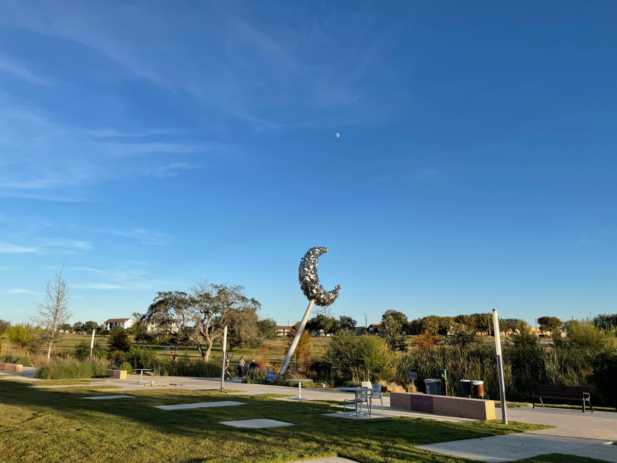 Running with the Moon sculpture at Greenline at Brooks